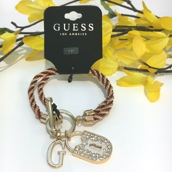 𝅺3/$29! GUESS Twisted Rope Bracelet with Lock - Picture 1 of 9